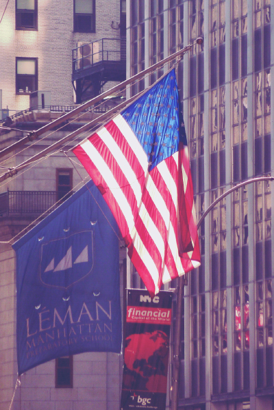 Flag hanging over Wall Street